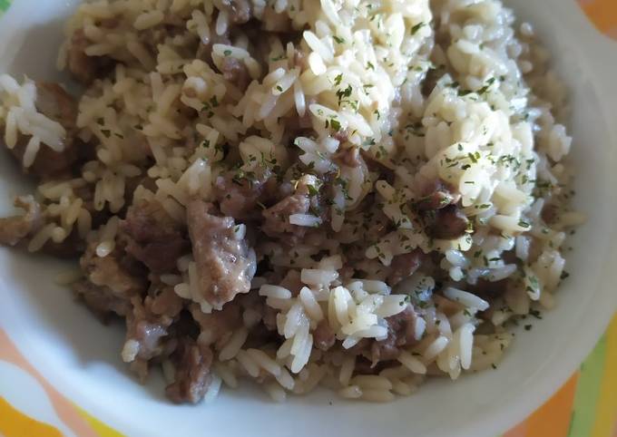 Passi a Preparare Veloce Risotto salsiccia e funghi