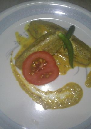 A picture of Sorse potol(parwal cooked in mustard seeds).