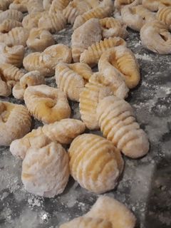 Una foto de Ñoquis de calabaza