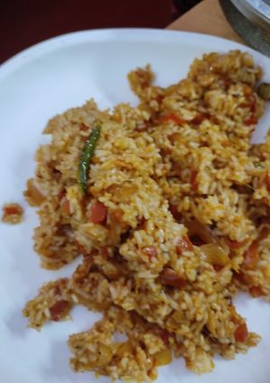 A picture of Tomato onion rice for lunch.