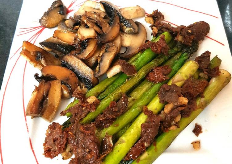 My Roasted Garlic Asparagus with sundried Tomato & Mushrooms. π