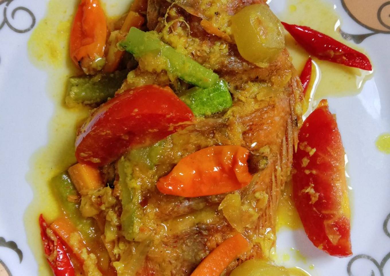 Pesmol ikan nila