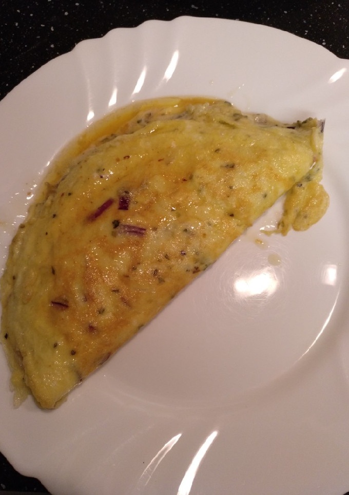 Una foto de Tortilla francesa: Jamón con queso y cebolla