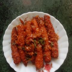 A picture of Baby corn schezwan dry.