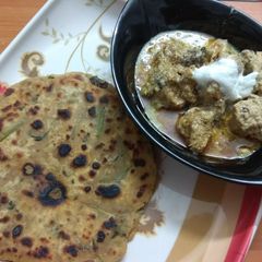 A picture of Malai Chicken and Dhaniya Paratha.
