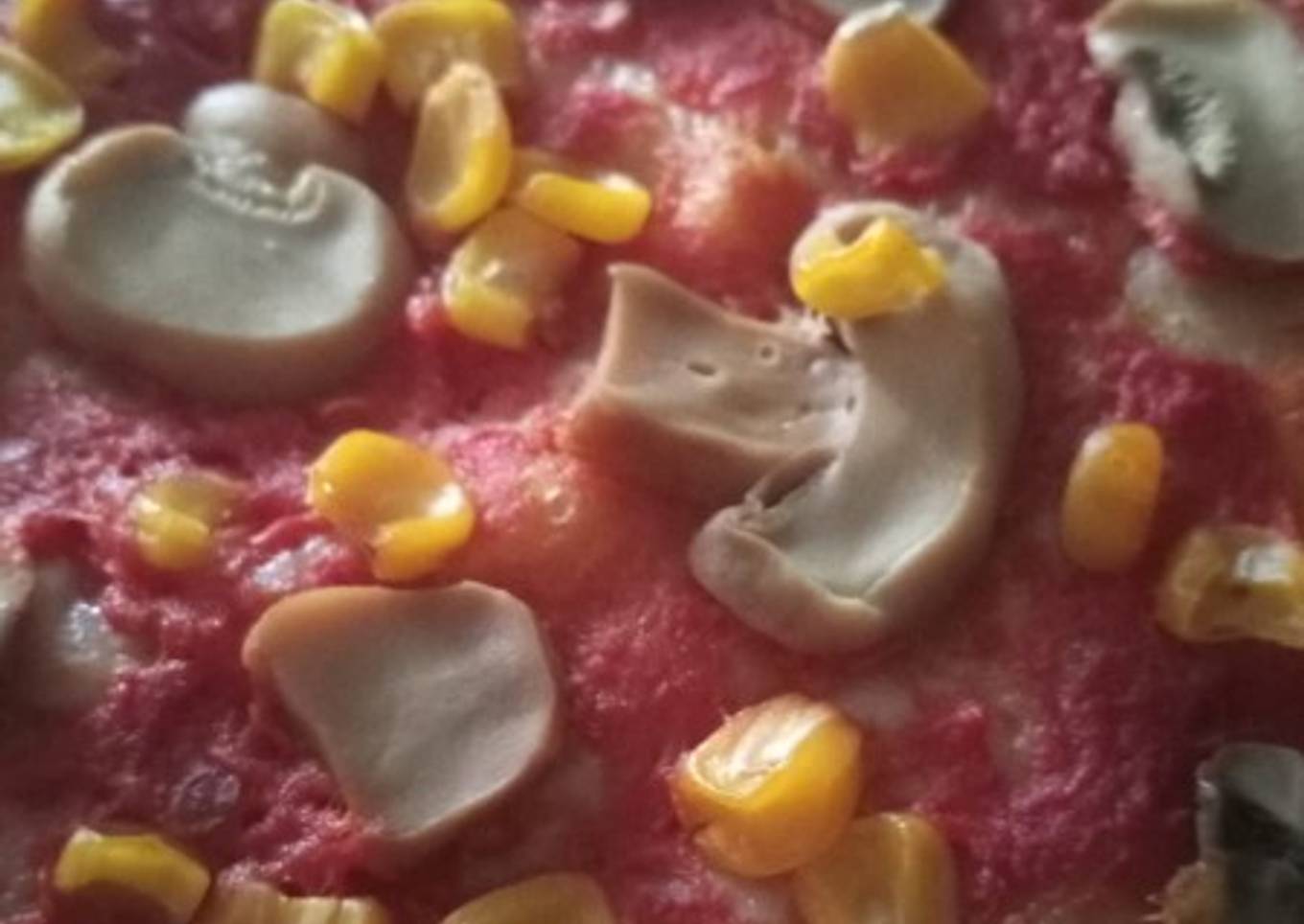 Pizza con champiñones y maíz