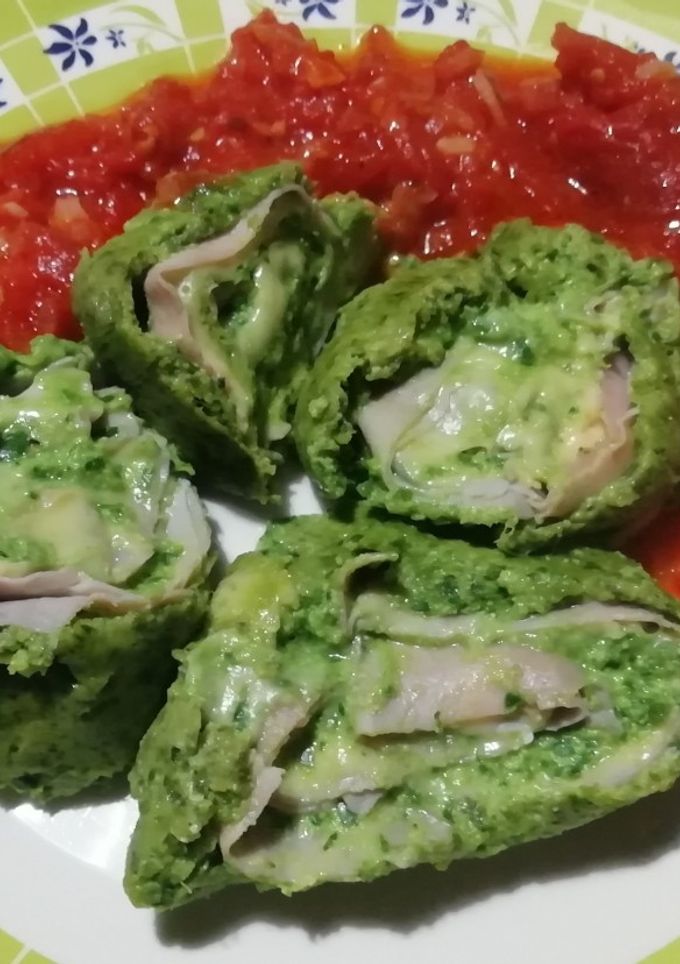 Una foto de Rollos de verdura y ricotta rellenos de jamón y queso