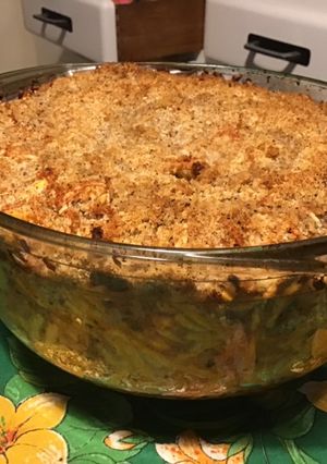 Une photo de Timbale de spätzles aux tomates, thon, emmental et curcuma