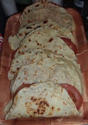 Una foto de Quesadilla de queso y tomate