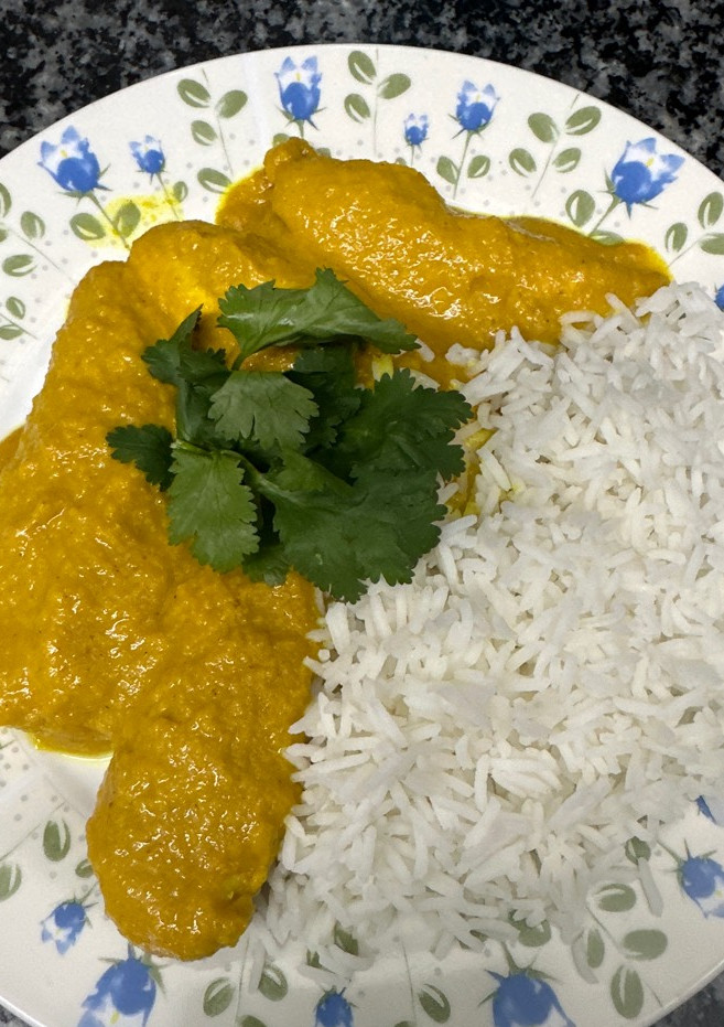 Una foto de 549. Pollo al Curry de mango y arroz basmati (principal carne)