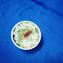 Spinach gravy & cheesy Green Khichu A picture of Spinach gravy & cheesy Green Khichu.