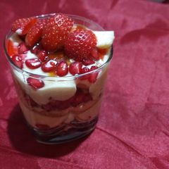 A picture of Fruits and curd parfait.