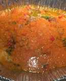 Pescado al horno en salsa de tomate