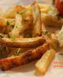 Papas con queso parmesano y ajo al horno