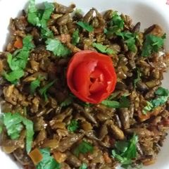 A picture of Kachnal with green chane.