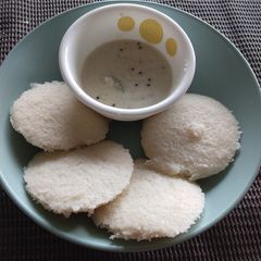Idli or steamed rice cake A picture of Idli or steamed rice cake.