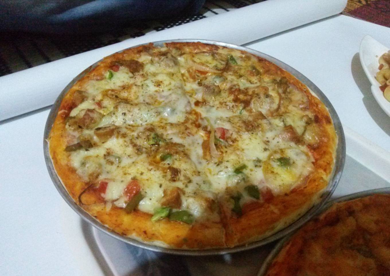 Chicken achari pizza