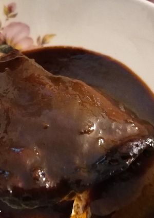 Una foto de Pollo en salsa de café
