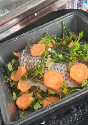Una foto de Tilapia al vapor