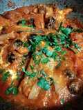 Baccalà con olive e cipolle