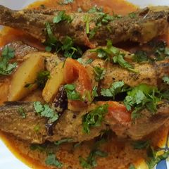 A picture of Pohala macha besara(Fried Pohala fish in tangy mustard gravy).