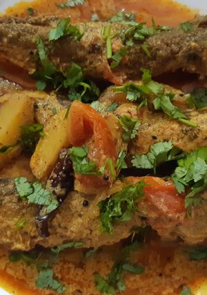 A picture of Pohala macha besara(Fried Pohala fish in tangy mustard gravy).