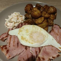 Gammon steaks with garlic and cajun air fryer potatoes A picture of Gammon steaks with garlic and cajun air fryer potatoes.