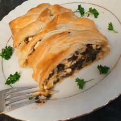 A picture of Mushroom, spinach parcel with feta cheese.