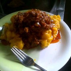 A picture of Asaro with Meat ball stew.