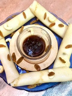 পাটিসাপটা (patisapta recipe in bengali) রেসিপির প্রধান ছবি