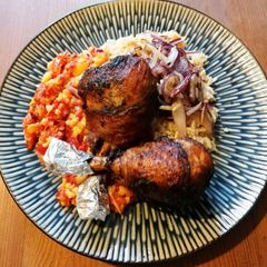 A picture of Crisp Chilli Chicken lollipops, Mango, Red Onion, Pepper, Lemon Salsa & Caramelised Onion Brown Rice.
