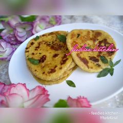 A picture of Buttery herb and garlic naan bread.