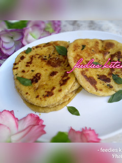 A picture of Buttery herb and garlic naan bread.