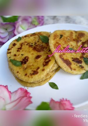 A picture of Buttery herb and garlic naan bread.