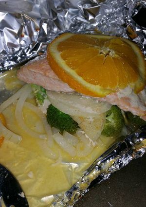 A picture of Orange Salmon with Broccolini.