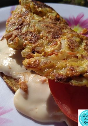 Una foto de Omelette con zanahoria y cebollita
