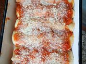 Una foto de canelones de ricota y nuez