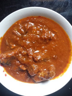 A picture of Tomatoes stew.