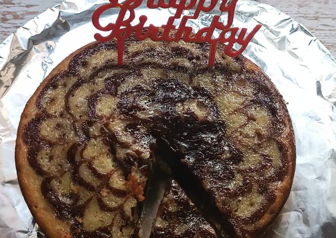 Eggless marble cake in pressure outlet cooker