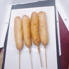 A picture of Corn dogs.