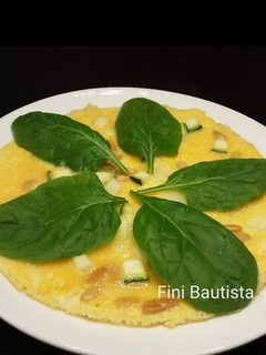Una foto de Torti pizza de calabacín y espinacas
