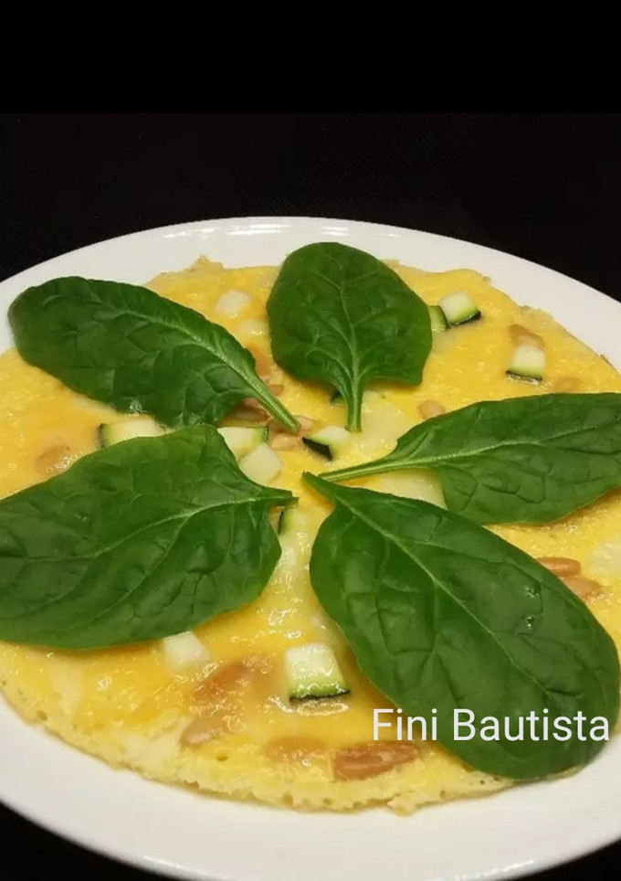 Una foto de Torti pizza de calabacín y espinacas