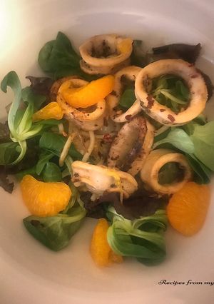 A picture of Salt & Pepper Calamari with Noodle & Mandarin Salad.