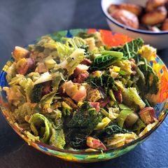 A picture of Leeks and cabbage with chorizo and apple.