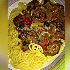 A picture of Curried spaghetti with meat sauce.