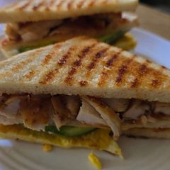 A picture of Balochi tikka club sandwich.