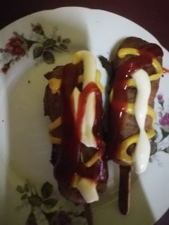 Una foto de Corn dog 💜