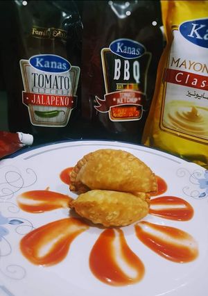 A picture of CHICKEN D-SHAPE SAMOSA.