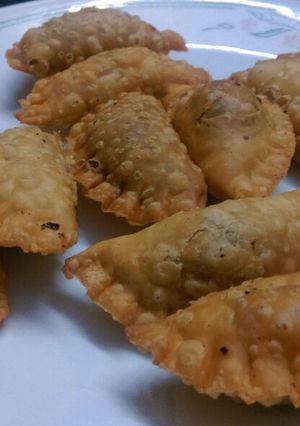 A picture of Besan Karanji/ Besan Gujjiya / Sweet Snacks.