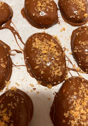 A picture of Melomakarona with Chocolate Coating.